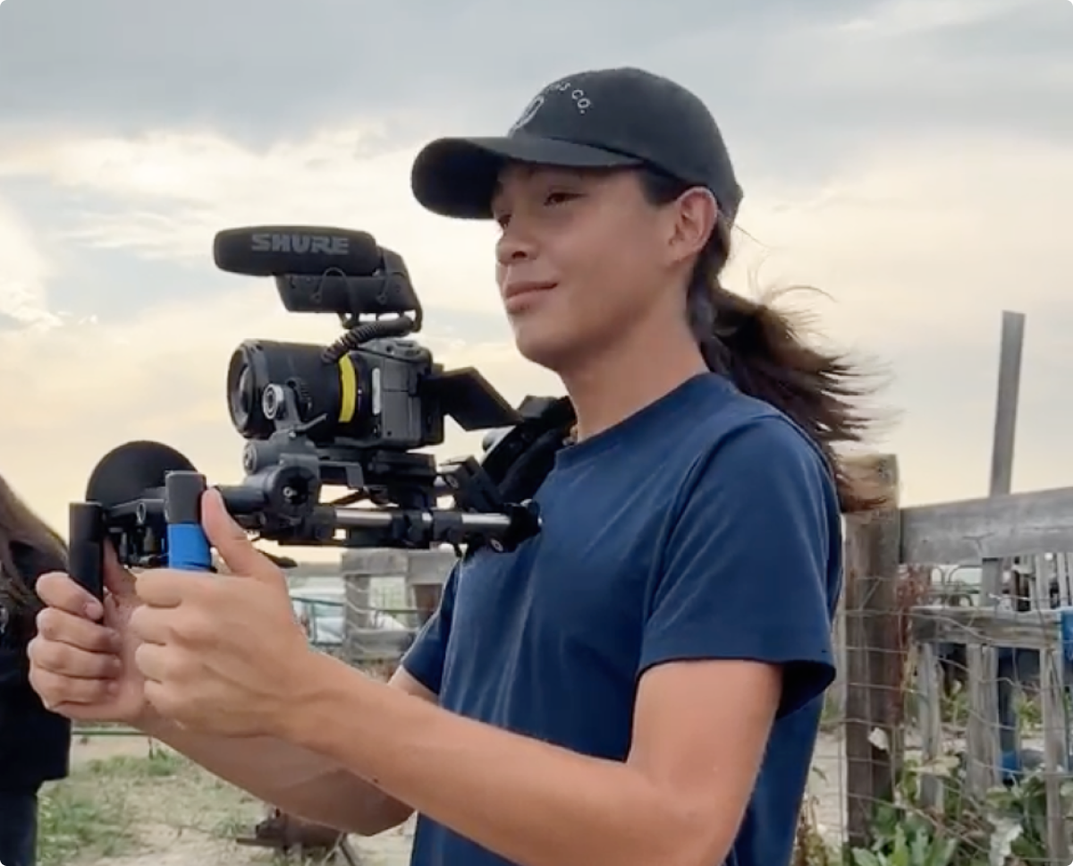 Camera operator with Wooden Camera camera rig
